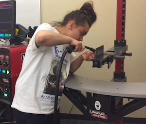 Student working with tools